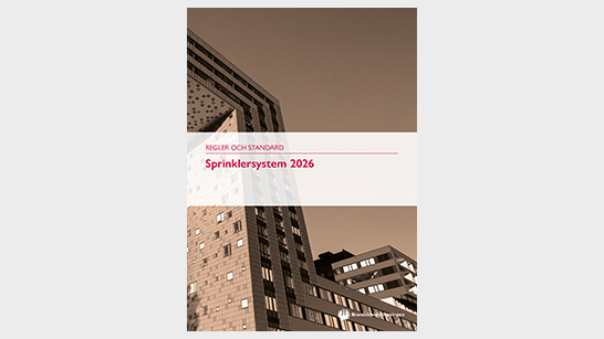 Omslagsbild på höghus till boken Sprinklersystem Regler och Standard